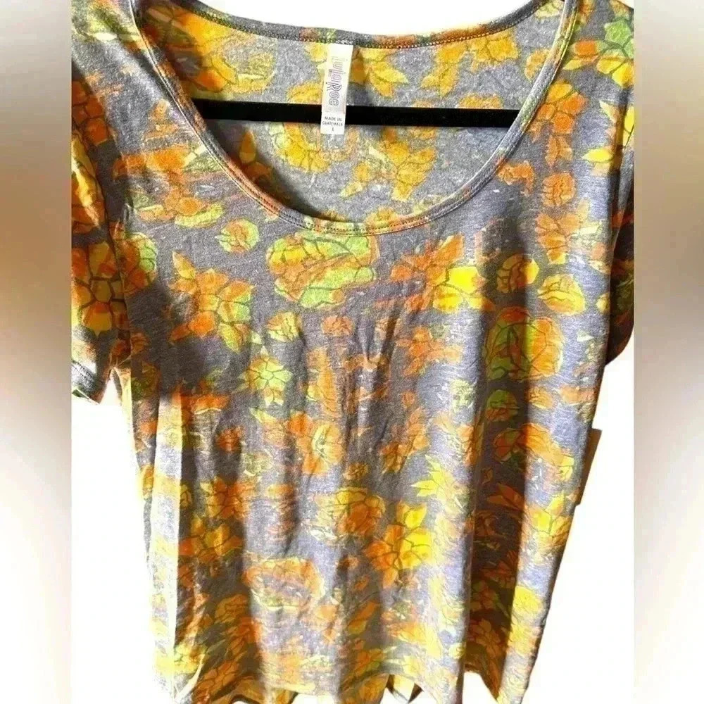 Lularoe large faded Heather blue Clasdic T with rose multi color pattern. NWT.